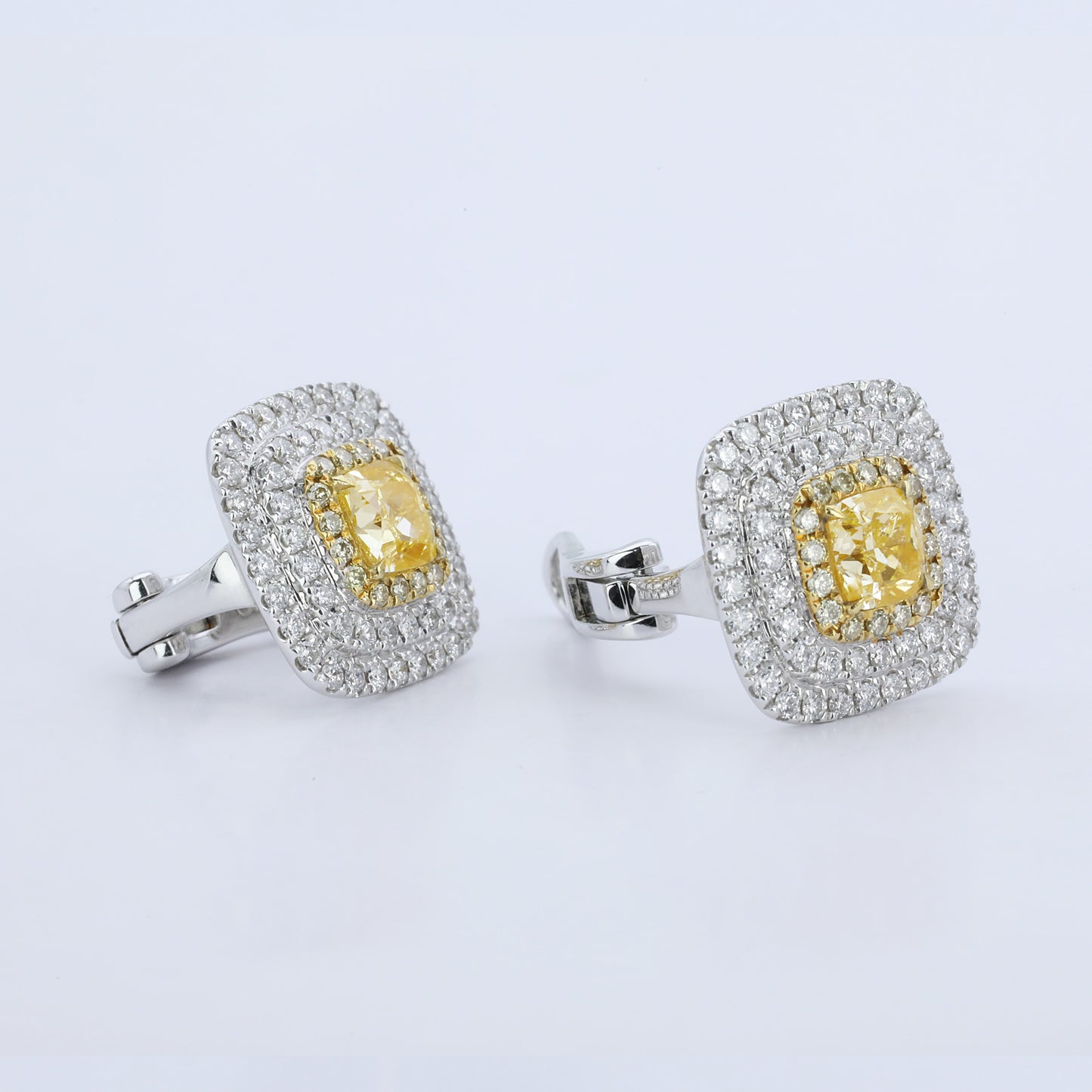 14k gold 2.26 ctw natural yellow diamond & diamond stud earrings